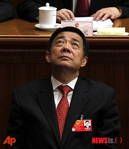 【베이징=AP/뉴시스】중국 보시라이 충칭 공산당 서기가 14일 전인대 폐회식에 앉아 있다.