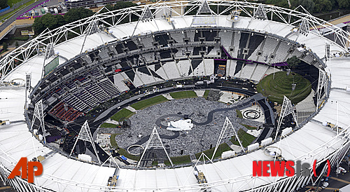 An aerial view of the London 2012 Olympic Stadium in east London, Friday, July 13, 2012, as its is prepared for the opening ceremony for the 2012 Olympic summer games which start on July 27. (AP Photo/Alastair Grant)