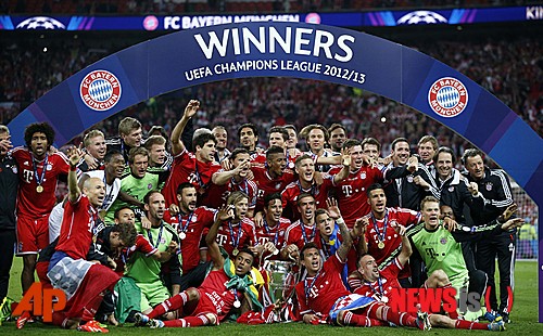 Bayern Munich players react, after winning the Champions League Final against Borussia Dortmund, at Wembley Stadium in London, Saturday, May 25, 2013. (AP Photo/Jon Super)