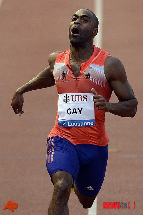 【로잔=AP/뉴시스】미국의 육상 단거리 스타 타이슨 게이(31)가 5일(한국시간) 스위스 로잔에서 열린 국제육상경기연맹(IAAF) 다이아몬드리그 8차 대회 '아틀레티시마' 남자 100ｍ 결승에서 역주를 펼치고 있다. 게이는 9초79의 기록으로 우승했다.