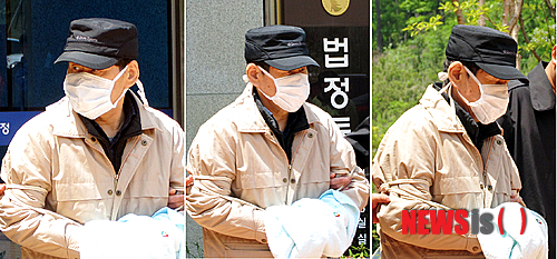 【목포=뉴시스】맹대환 기자 = 법원의 구속영장 실질심사에서 혐의를 전면 부인한 김한식(72) 청해진해운 대표가 9일 오후 광주지법 목포지원에서 심문을 마치고 법정을 빠져 나오며 무언가를 찾듯이 좌우를 두리번거린 후 기자들의 질문이 이어지자 눈을 감고 있다. 2014.05.09 mdhnews@newsis.com