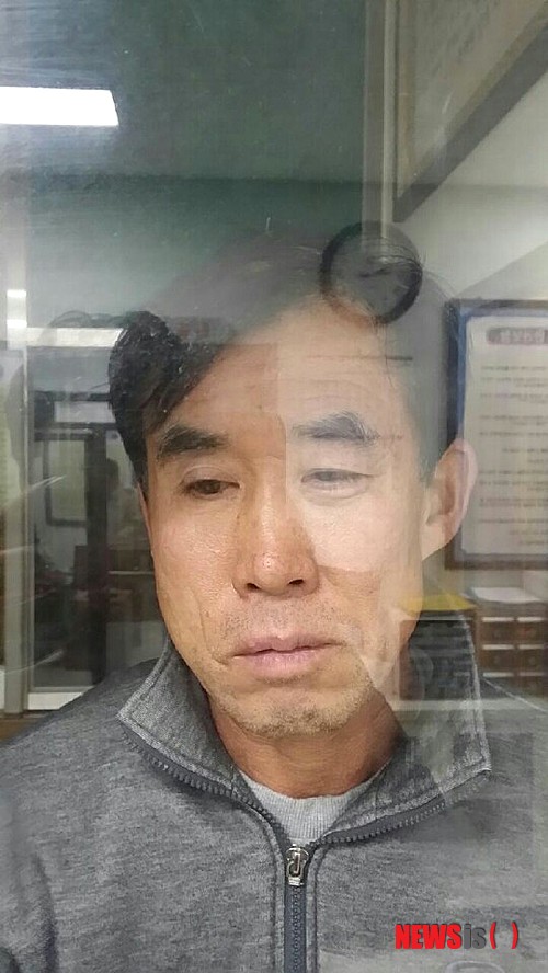 【수원=뉴시스】노수정 기자 = 13일 경기지방경찰청 수사본부는 수원 팔달산 토막살인 사건 피의자 박춘봉(55)의 얼굴을 공개했다. 2014.12.13. (사진=경기지방경찰청 제공) photo@newsis.com