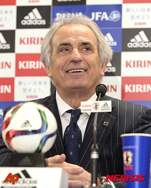 Japan's new coach Vahid Halilhodzic smiles during a news conference after Japan defeated Tunisia in a friendly in Oita, southern Japan, Friday, March 27, 2015. Shinji Okazaki and Keisuke Honda scored second-half goals as Japan beat Tunisia 2-0 in its first game under Halilhodzic of Bosnia Herzegovina. (AP Photo/Kyodo News, Nobuki Ito) JAPAN OUT, MANDATORY CREDIT