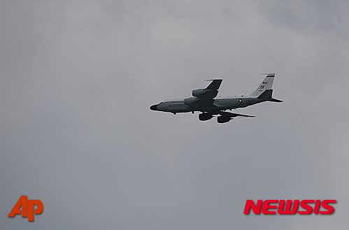 A U.S. Air Force RC-135S Cobra Ball returns to Kadena Air Base in Okinawa, southwestern Japan, Thursday, Jan. 7, 2016. North Korea said Wednesday it had conducted a hydrogen bomb test, a defiant and surprising move that, if confirmed, would put Pyongyang a big step closer toward improving its still-limited nuclear arsenal. (AP Photo/Koji Ueda)