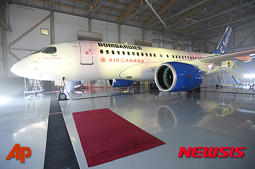 【캐나다=AP/뉴시스】캐나다의 항공기 제작업체 봄바디어(Bombardier)는 17일(현지시간) 전체 인력의 10%에 해당하는 직원 약 7000명을 감원할 계획이라고 밝혔다. 2016.2.18. 