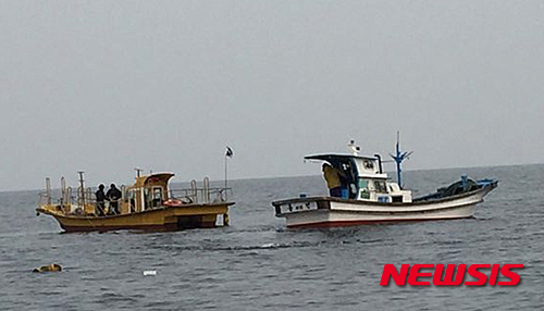 日관방 "한일 어선 충돌…日피해 없어"