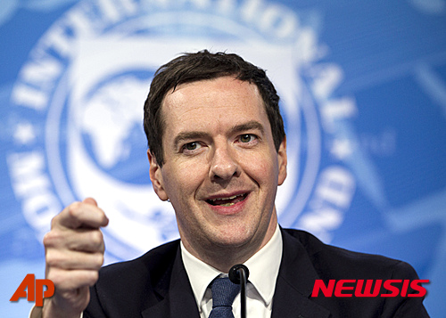 FILE - This is a Thursday, April 14, 2016. file photo of Britain's Chancellor of the Exchequer George Osborne as he gestures while speaking at a news conference during the the G5 Ministers of Finance meeting during the World Bank/IMF Spring Meetings in Washington. Osborne has put a price tag on leaving the European Union costing Britain the equivalent of $6,100 per household. The estimate is based on a 200-page analysis of the long-term costs and benefits of EU membership and its alternatives that George Osborne published Monday April 18, 2016 ahead of the June 23 referendum. ( AP Photo/Jose Luis Magana, File)