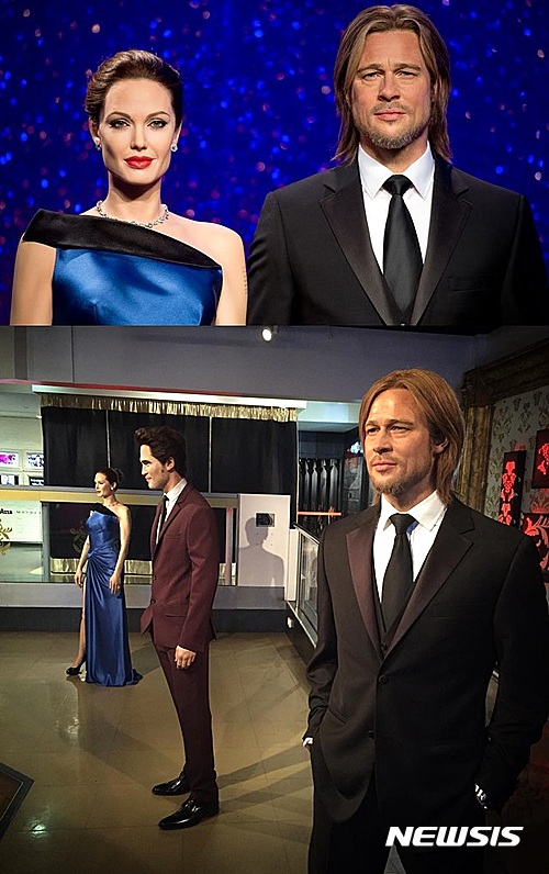 【서울=뉴시스】할리우드 배우 브래드 피트와 안젤리나 졸리의 이혼 소식이 전해져 충격을 안긴 가운데 영국 런던의 마담 투소 박물관은 두 사람 밀랍인형을 분리해 전시했다. 21일(현지시간) 영국 런던의 마담 투소 박물관은 공식 트위터 계정을 통해 이같이 밝혔다. 예전에 나란히 제시된 두 사람 인형(위)과 분리된 두 사람 인형. (사진출처: 마담투소 박물관) 2016.&nbsp; 