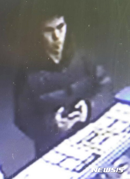 This image taken from CCTV provided by Haberturk Newspaper Monday Jan. 2, 2017 shows the man identified by police as the main suspect in the New Year's Day terror attack at an Istanbul nightclub, earlier that night before the attack. The attack at the nightclub in Istanbul's Ortakoy district during New Year's celebrations, killed dozens of people and wounded dozens of others. (CCTV/Haberturk Newspaper via AP)