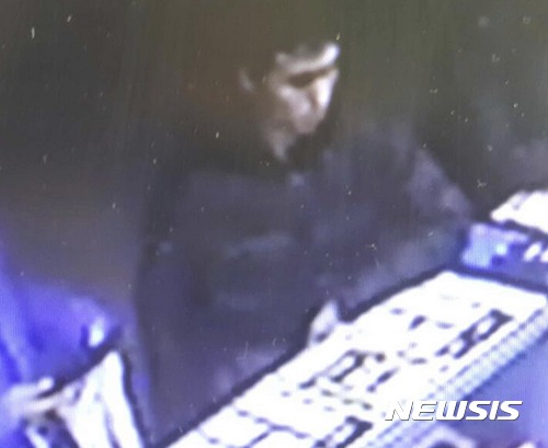 This image taken from CCTV provided by Haberturk Newspaper Monday Jan. 2, 2017, shows the man identified by police as the main suspect in the New Year's Day terror attack at an Istanbul nightclub, earlier that night before the attack. The attack at the nightclub in Istanbul's Ortakoy district during New Year's celebrations, killed dozens of people and wounded dozens of others.(CCTV/Haberturk Newspaper via AP)
