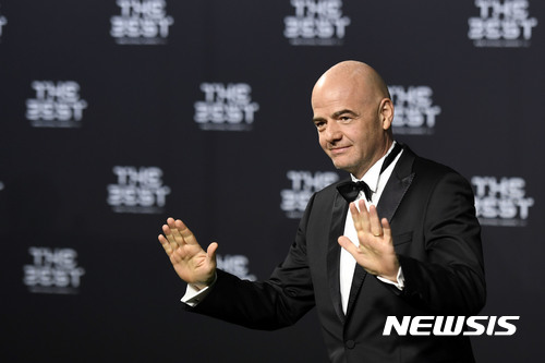 FIFA President, Gianni Infantino, poses for a photo on the green carpet while arriving for the The Best FIFA Football Awards 2016 ceremony in Zurich, Switzerland, Monday, Jan. 9, 2017. (Walter Bieri/Keystone via AP)