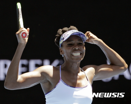 United States' Venus Williams celebrates after defeating Russia's Anastasia Pavlyuchenkova during their quarterfinal at the Australian Open tennis championships in Melbourne, Australia, Tuesday, Jan. 24, 2017. (AP Photo/Aaron Favila)