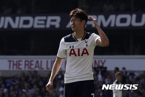 Tottenham's Son Heung-Min looks dejected after missing a hattrick chance during the English Premier League soccer match between Tottenham Hotspur and Watford at White Hart Lane in London, Saturday April 8, 2017. (AP Photo/Tim Ireland)