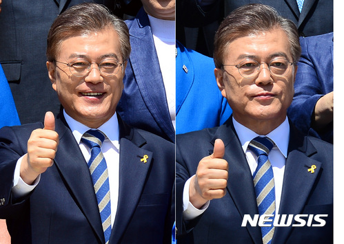 【서울=뉴시스】박영태 기자 = 문재인 더불어민주당 대선후보가 26일 오전 서울 영등포구 여의도 국회에서 진행된 ‘문재인 후보 천군만마 국방안보 1000인 지지선언 기자회견’에서 엄지척을 하고 있다. 문 후보의 표정이 전날 방송토론에서 했던 동성애 반대 발언과 관련한 성소수자 인권단체 회원들의 기습 시위를 하기 전(왼쪽)과 후의 표정이 비교되고 있다. 2017.04.26. since1999@newsis.com