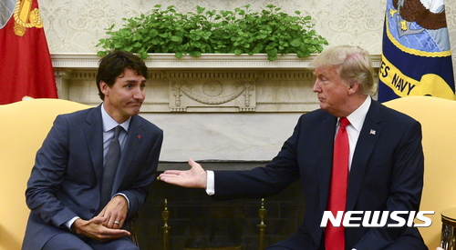 트럼프, 트뤼도 캐나다 총리에게 "美 NAFTA 탈퇴 가능 "