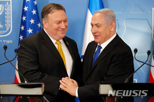 In this Sunday, April 29, 2018 file photo, U.S. Secretary of State Mike Pompeo. left. is greeted by Israeli Prime Minister Benjamin Netanyahu ahead of a press conference at the Ministry of Defense in Tel Aviv. Israel&#039;s prime minister has scheduled a special prime-time statement to reveal what his office said would be a &quot;meaningful development&quot; in the Iranian nuclear program. The surprise announcement came as Netanyahu canceled a scheduled speech at the parliament and instead called an emergency meeting of his Security Cabinet at Israeli military headquarters in Tel Aviv.(Thomas Coex, AFP via AP, File)