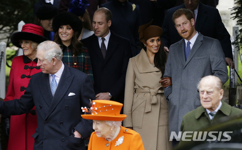 FILE - In this Monday, Dec. 25, 2017 file photo, front from left, Prince Charles, Queen Elizabeth II and Prince Philip. Rear From left, Camilla, Duchess of Cornwall, Kate, Duchess of Cambridge, Price William, Meghan Markle, and her fiancee Prince Harry, following the traditional Christmas Day church service, at St. Mary Magdalene Church in Sandringham, England. Kensington Palace announced on Friday, May 18, 2018 Prince Charles will walk Meghan Markle down the aisle in her wedding to Prince Harry. (AP Photo/Alastair Grant, file)