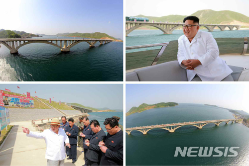 【서울=뉴시스】 북한 노동신문은 김정은 노동당 위원장 겸 국무위원장이 고암-답촌철길을 현지 료해(사정이나 형편이 어떠한가를 알아봄)했다고 25일 보도했다. 2018.05.25. (출처=노동신문) photo@newsis.com