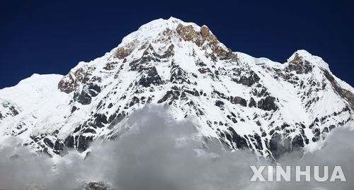 (180606) -- KASKI, June 6, 2018 (Xinhua) -- Photo taken on June 6, 2018 shows the view of Annapurna ranges from Annapurna base camp in Kaski, Nepal. (Xinhua/Sunil Sharma) (djj)
