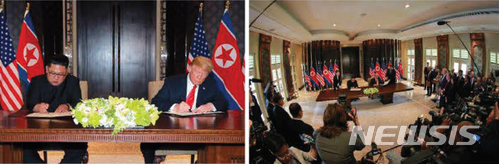 【서울=뉴시스】 북한 노동신문은 지난 12일 김정은 국무위원장이 도널드 트럼프 대통령과 싱가포르 센토사섬 카펠라 호텔에서 북미정상회담을 한 모습을 13일 보도했다. 2018.06.13. (출처=노동신문) photo@newsis.com