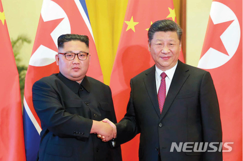 【서울=뉴시스】 북한 노동신문은 지난 19일 김정은 국무위원장이 중국을 방문해 시진핑 국가주석을 만나 회담 및 만찬을 했다고 20일 보도했다. 2018.06.20. (출처=노동신문)&nbsp; photo@newsis.com