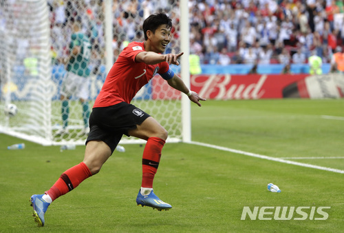 South Korea&#039;s Son Heung-min celebrates after scoring his side&#039;s second goal during the group F match between South Korea and Germany, at the 2018 soccer World Cup in the Kazan Arena in Kazan, Russia, Wednesday, June 27, 2018. (AP Photo/Michael Probst)