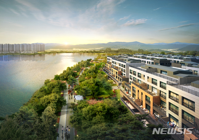 【전주=뉴시스】김민수 기자 = 계성건설이 전북 법조타운인 전주 만성지구에 고급 빌리지형태의 테라스 하우스인 “이지움 레이크 테라스”를 공급한다. 사진은 투시도. photo@newsis.com