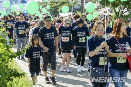 【서울=뉴시스】서울시는 '제4회 서울시각장애인과 함께 뛰는 어울림마라톤대회'를 개최한다. <사진제공=서울시> 2018.09.14 