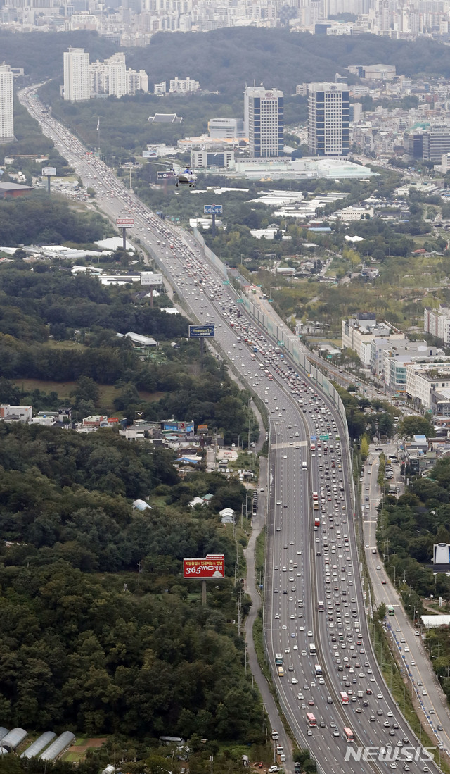 T맵 · 카카오내비' 귀성·귀경길 책임진다…운전자 선택은?
