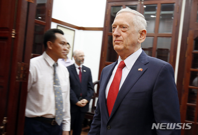 U.S. Defense Secretary Jim Mattis arrives for a meeting with Ho Chi Minh City's communist party chief Nguyen Thien Nhan in Ho Chi Minh City, Vietnam Tuesday, Oct. 16, 2018. (Kham/Pool Photo via AP)