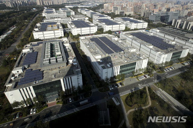 This shows Huawei research and development centre in Dongguan in south China's Guangdong province, Tuesday, Dec. 18, 2018. While a top executive of Chinese tech giant Huawei faces possible U.S. charges over trade with Iran, the company's goal to be a leader in next-generation telecoms is colliding with security worries abroad. Australia and New Zealand have barred Huawei as a supplier for fifth-generation networks, joining the U.S. and Taiwan. Last week, Japan's cybersecurity agency said Huawei and other vendors deemed risky will be off-limits for government purchases. (AP Photo/Andy Wong)