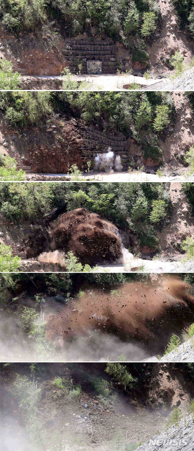 【서울=뉴시스】사진공동취재단 = 5월 24일 북한 핵무기연구소 관계자들이 함경북도 길주군 풍계리 핵실험장 폐쇄를 위한 폭파 작업을 했다. 사진은 4번 갱도가 폭파되는 모습. 2018.12.26.photo@newsis.com 고)