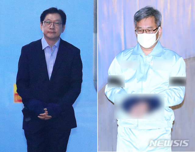 【서울=뉴시스】 배훈식 이윤청 기자 = 지난 1월30일 실형을 선고받고 호송차로 향하는 김경수 경남도지사(왼쪽)와 오전에 선고공판에 출석하기 위해 법정으로 향하는 '드루킹' 김동원 씨. 2019.01.30. photo@newsis.com