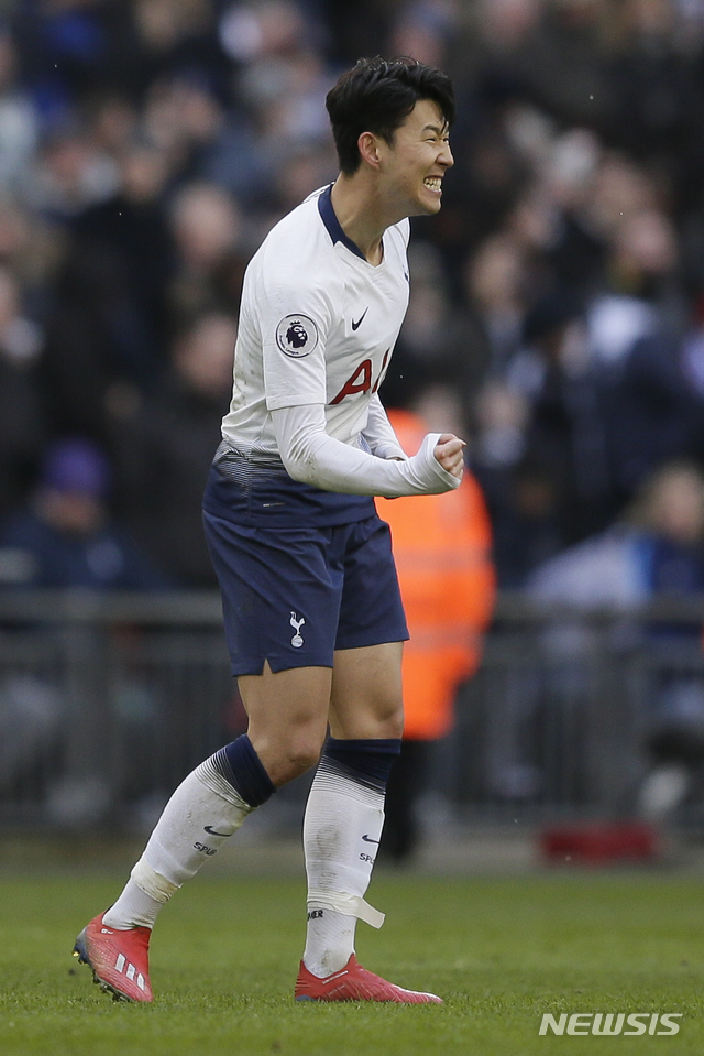 Tottenham's Son Heung-min, celebrates after scoring his side's opening goal during the English Premier League soccer match between Tottenham Hotspur and Newcastle at Wembley Stadium in London, Saturday, Feb. 2, 2019. (AP Photo/Tim Ireland)