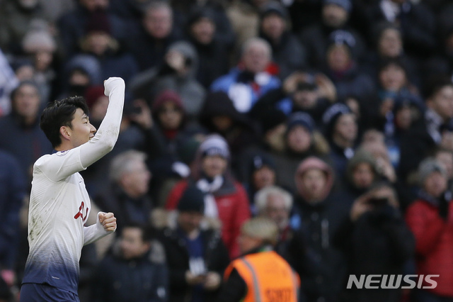 Tottenham's Son Heung-min, celebrates after scoring his side's opening goal during the English Premier League soccer match between Tottenham Hotspur and Newcastle at Wembley Stadium in London, Saturday, Feb. 2, 2019. (AP Photo/Tim Ireland)