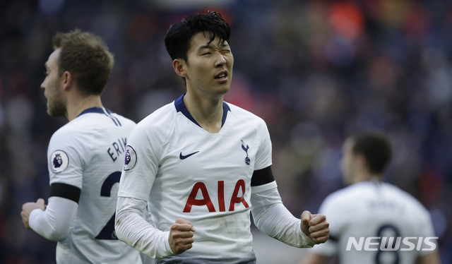 Tottenham Hotspur's Son Heung-min celebrates after scoring his side's third goal during the English Premier League soccer match between Tottenham Hotspur and Leicester City at Wembley stadium in London, Sunday, Feb. 10, 2019. (AP Photo/Matt Dunham)
