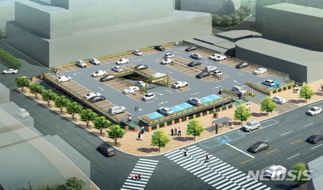 【부산=뉴시스】허상천 기자 = 부산시는 부전시장 인근 옛 병무청 부지에 운영중인 부전역 공영주차장을 올 9월까지 지금의 2배규모로 확충할 계획이라고 18일 밝혔다. 2019.03.18. (조감도 = 부산시 제공) photo@newsis.com
