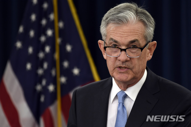 Federal Reserve Chair Jerome Powell speaks during a news conference in Washington, Wednesday, March 20, 2019. The Federal Reserve left its key interest rate unchanged Wednesday and projected no rate hikes in 2019, dramatically underscoring its plan to be "patient" about any further increases. (AP Photo/Susan Walsh)