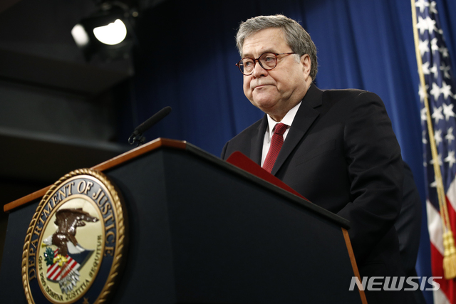 Attorney General William Barr speaks about the release of a redacted version of special counsel Robert Mueller's report during a news conference, Thursday, April 18, 2019, at the Department of Justice in Washington. (AP Photo/Patrick Semansky)