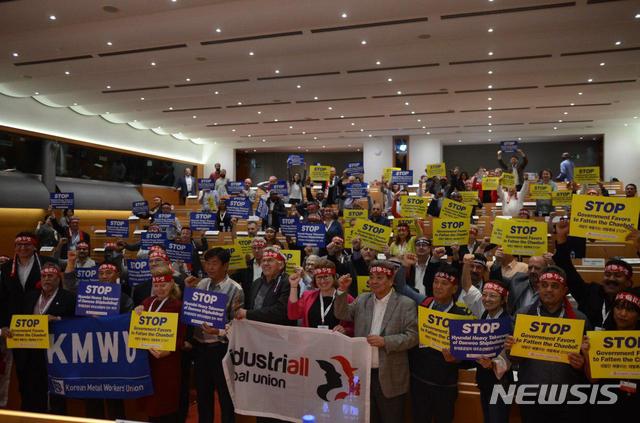 【서울=뉴시스】국제제조산업노조가 지난 22일 벨기에 브뤼셀에서 열린 국제제조산업노조 세계중앙집행위원회에서 현대중공업의 대우조선해양 인수 반대를 결의했다. (사진=금속노조 제공)