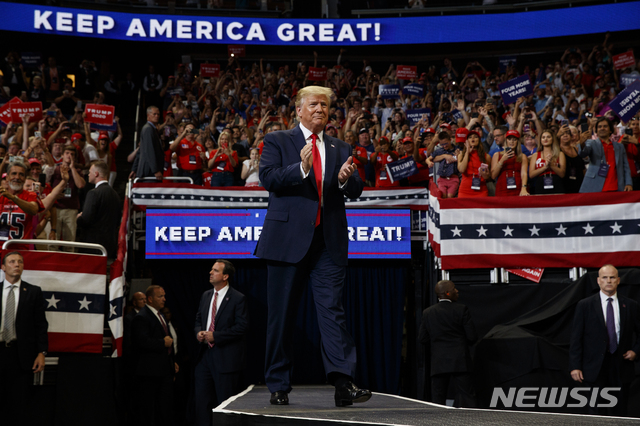 President Donald Trump arrives to speak at his re-election kickoff rally at the Amway Center, Tuesday, June 18, 2019, in Orlando, Fla. (AP Photo/Evan Vucci)