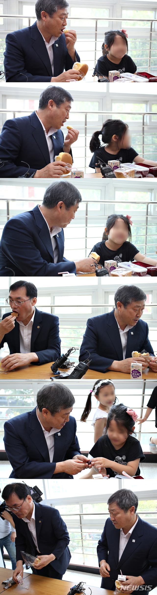 【청주=뉴시스】 인진연 기자 = 전국학교 비정규직연대회의(학비연대) 총파업 이틀째인 4일, 교육부 박백범 차관과 충북도교육청 위기 대응TF 총괄책임자인 홍민식 부교육감이 청주 만수초등학교에서 대체 급식 현황을 점검한 뒤 학부모가 싸준 도시락을 먹는 학생에게 여러 차례 빵을 먹자고 권했지만 연거푸 거절을 당했다. 머쓱했던 박 차관은 학생이 건넨 과일을 먹은 뒤 결국, 빵을 절반도 먹지 않은 채 홍 부교육감과 함께 자리에서 일어섰다. 2019.07.04 inphoto@newsis.com