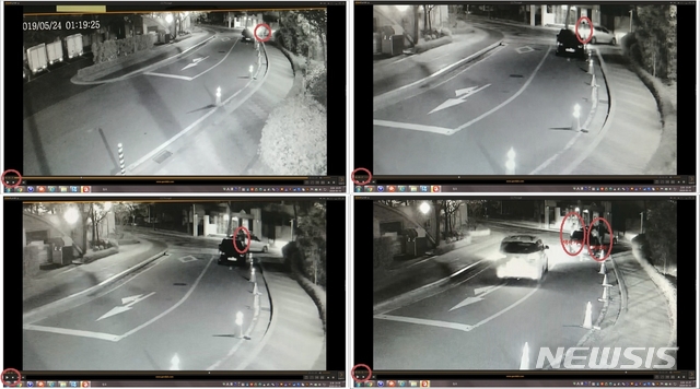 【서울=뉴시스】보험금 인상을 약점으로 개인택시만 골라 탑승, 하차 후 후진하는 차량에 부딪혔다고 거짓말을 해 돈을 뜯어낸 혐의를 받는 조모(31)씨가 경찰에 붙잡혔다. 사진은 지난 5월24일 폐쇄회로(CC)TV 카메라에 찍힌 범행 장면. 택시에서 내린 뒤 차 후미에서 서성이다가 고통을 호소하는 모습이 담겼다. 2019.07.05 (제공=서울 관악경찰서)