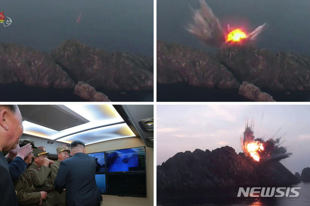 【서울=뉴시스】 김정은 북한 국무위원장이 지난 6일 새벽 '신형전술유도탄 위력시위발사를 참관했다'고 조선중앙TV가 7일 보도하고 있다.&nbsp; 서부작전비행장에서 발사된 전술유도탄 ２발은 수도권지역 상공과 우리 나라 중부내륙지대 상공을 비행하여 조선동해상의 설정된 목표섬을 정밀타격하였다고 보도했다. 2019.08.07. (사진=조선중앙TV 캡쳐)&nbsp; photo@newsis.com