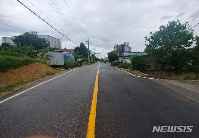 개선공사가 완료된 지방도 321호선 구간 남사면 봉명리 73-10 일대. (사진제공=용인시 처인구) 