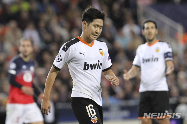 Valencia's Lee Kang-in reacts during the Champions League group H soccer match between Valencia and Lille at the Mestalla stadium in Valencia, Spain, Tuesday, Nov. 5, 2019. (AP Photo/Alberto Saiz)