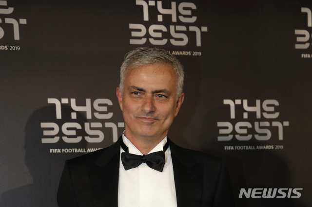 FILE - In this Sept. 23, 2019, file photo, Jose Mourinho arrives to attend the Best FIFA soccer awards, in Milan's La Scala theater, northern Italy. Tottenham has hired Mourinho as manager, a day after firing Mauricio Pochettino. (AP Photo/Luca Bruno, File)