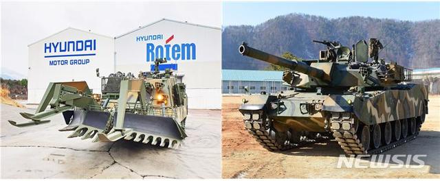 [창원=뉴시스] 현대로템 장애물개척전차(왼쪽)와 현대로템 K1E1 전차.(사진=현대로템 제공)