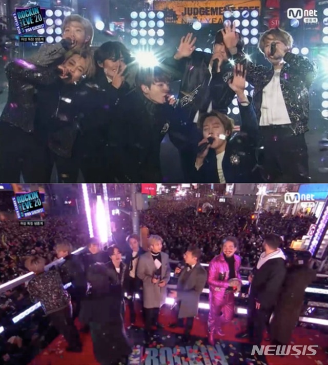 [서울=뉴시스] 그룹 '방탄소년단'이 미국 뉴욕 타임스 스퀘어에서 새해를 맞았다. (사진=엠넷 방송화면 캡처) 2020.01.01.