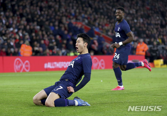 Tottenham Hotspur's Son Heung-min celebrates scoring his side's first goal of the game during the FA Cup fourth round soccer match between Southampton and Tottenham Hotspur at St Mary's Stadium, Southampton, England. Saturday, Jan. 25, 2020. (Steven Paston/PA via AP)